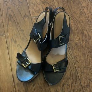 Target size 11 black leather wedges with gold buckles